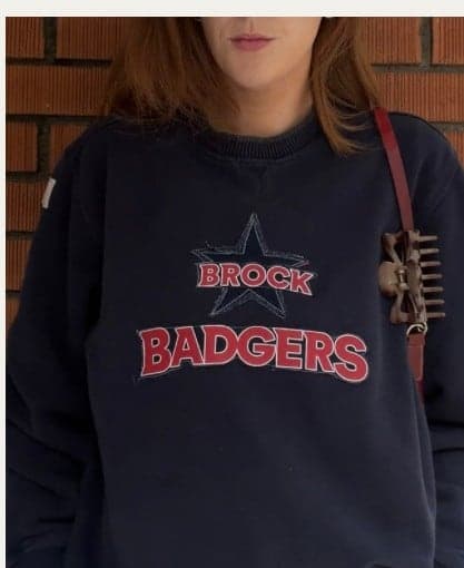 A navy Brock Badgers crewneck